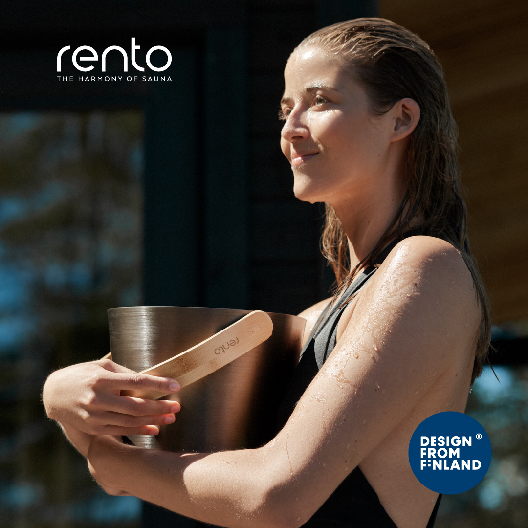 woman holding a sauna bucket outdoors